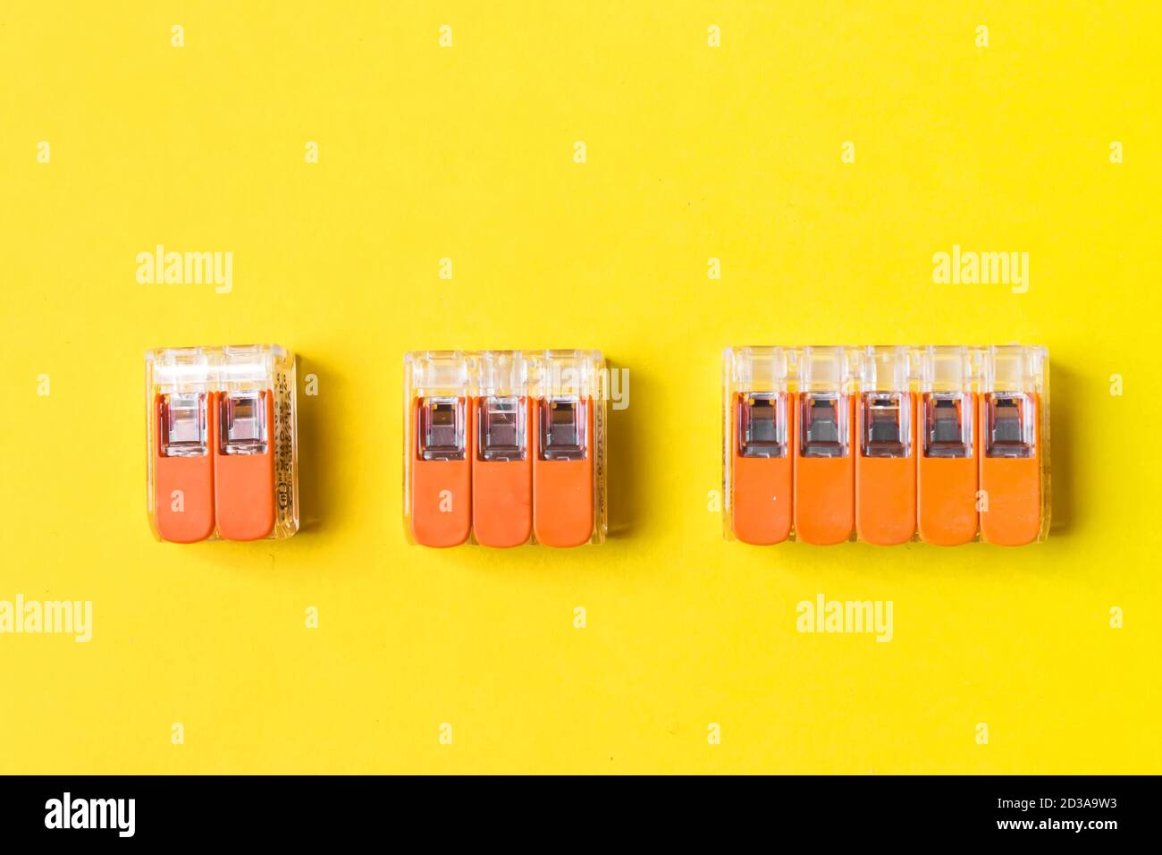 Set of compact splicing connector isolated on yellow background