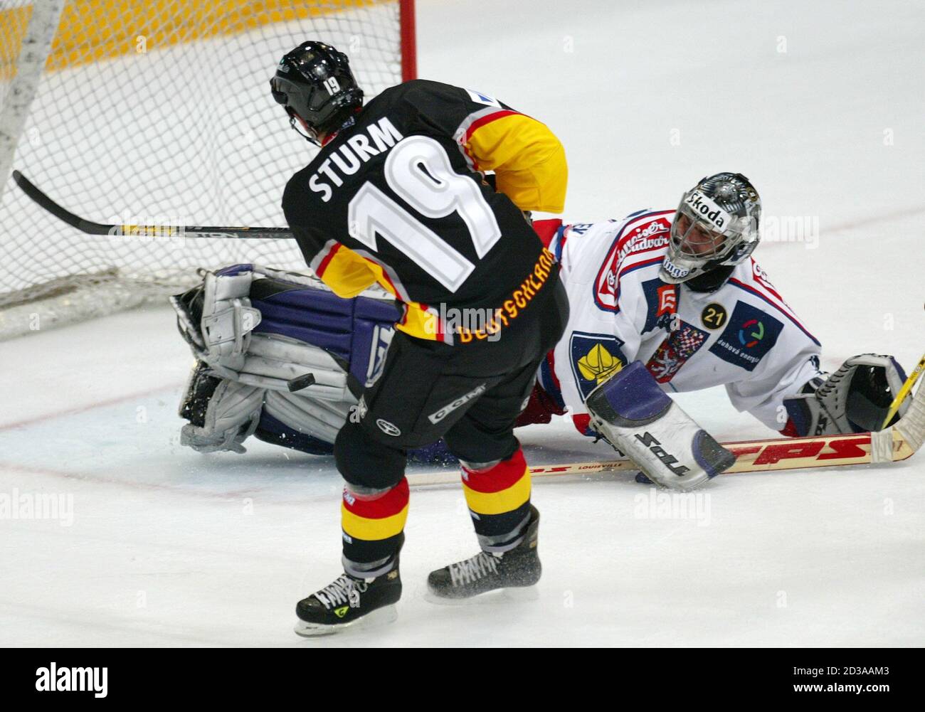 Germany S Sturm Tries To Score Against Czech Goalie Cechmanek During World Cup Exhibition Game In Cologne Germany S Marco Sturm L Tries To Score Against Czech Goalie Roman Cechmanek During A World Cup
