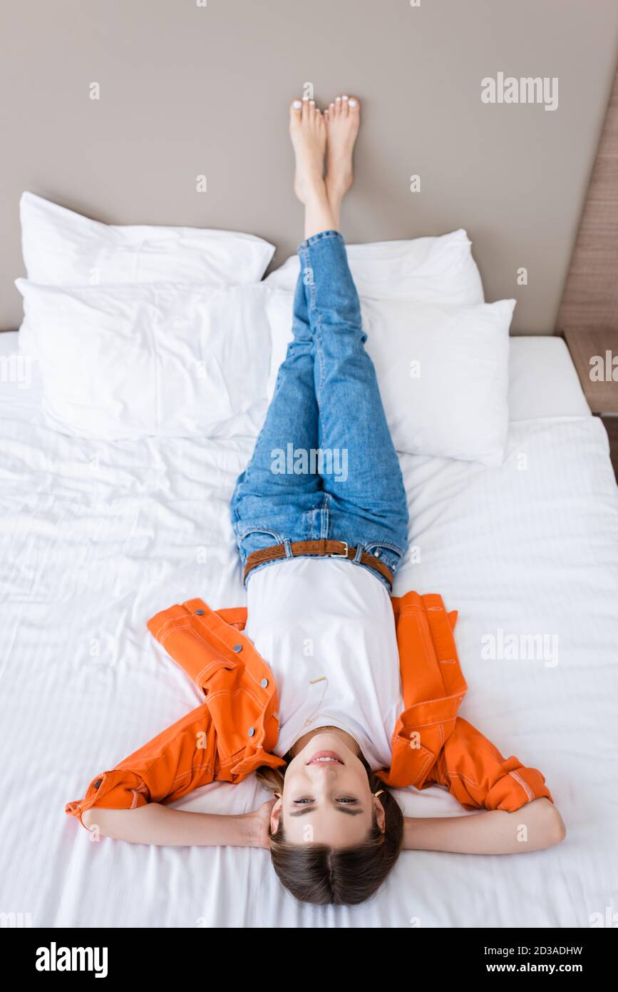Barefoot woman jeans hi-res stock photography and images - Alamy