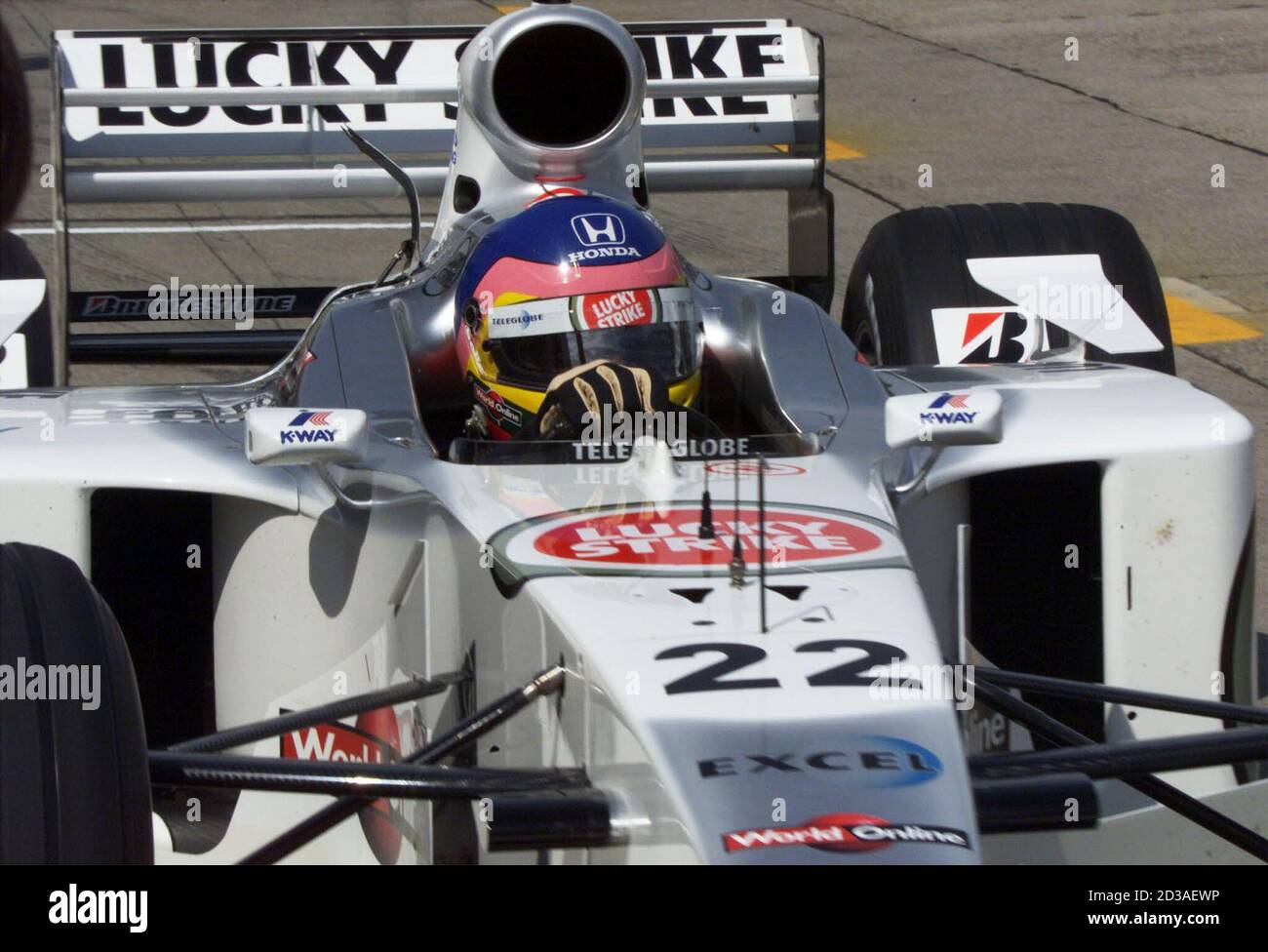 Canadian Jacques Villeneuve in a BAR Honda drives into his team pit during  a free practice run at Suzuka Circuit October 6, 2000 for the F1 Japanese  Grand Prix race on Sunday.