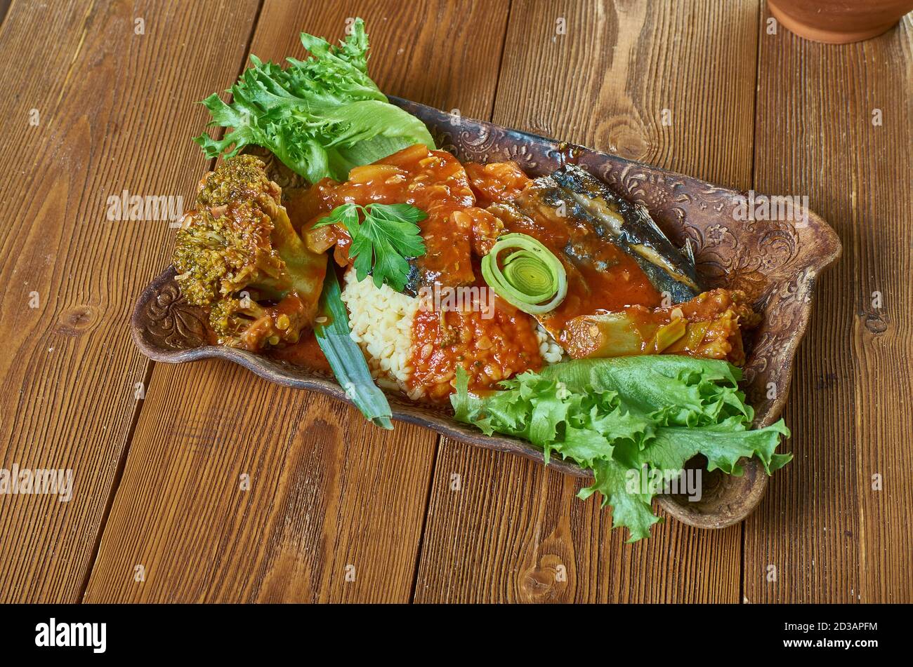 Coo-Coo and Flying Fish, national dish of Barbados, cornmeal and okra porridge Stock Photo - Alamy
