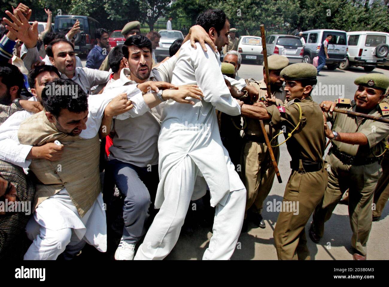 Indian police struggle with activists of moderate faction of the All  Parties Hurriyat (Freedom) Conference (APHC) during a protest in Srinagar,  July 25, 2005. Indian police on Monday detained at least 20