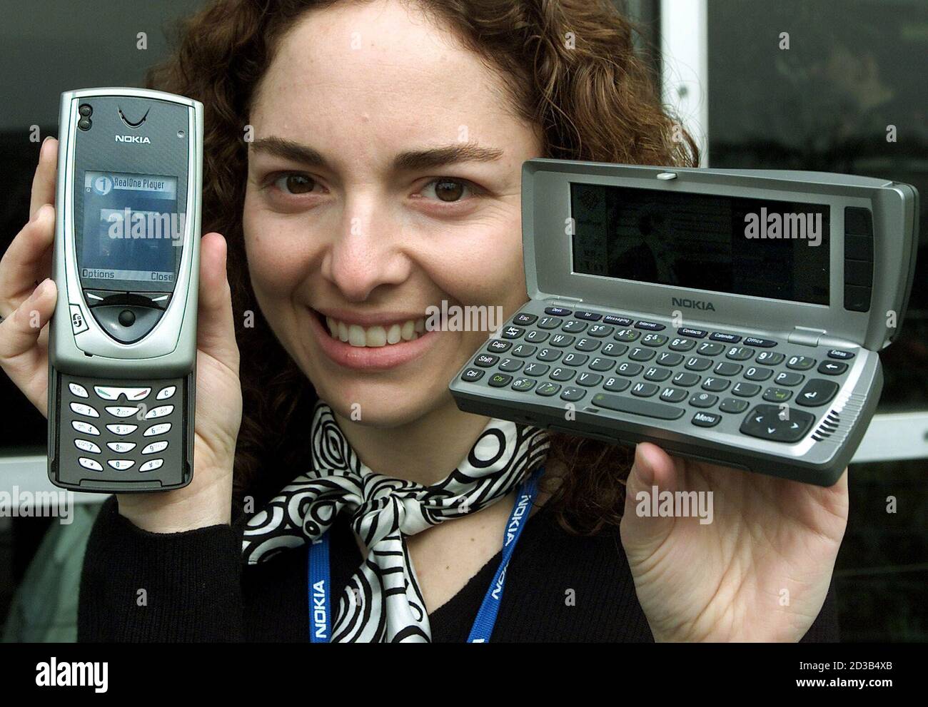 A Model Displays The Latest Nokia 7650 L Mobile Phone With An Integrated Camera And The 9210i Communicator R As World Premier At The Cebit Fair In Hanover March 12 02 About