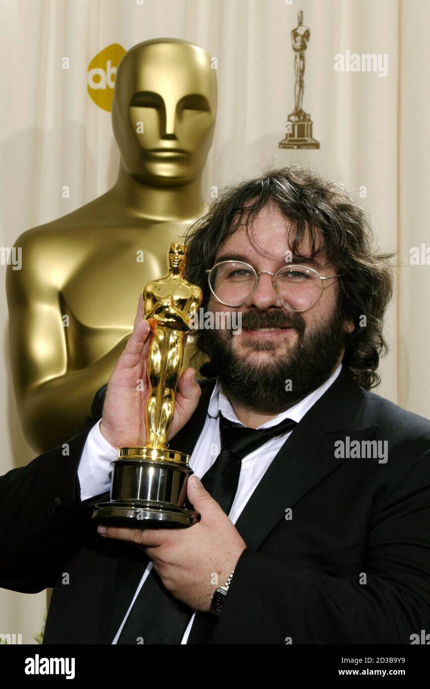 PICTURES OF THE YEAR 2004 - Director Peter Jackson holds his Oscar for best  adapted screenplay for "The Lord of the Rings:The Return of the King"  during the 76th annual Academy Awards