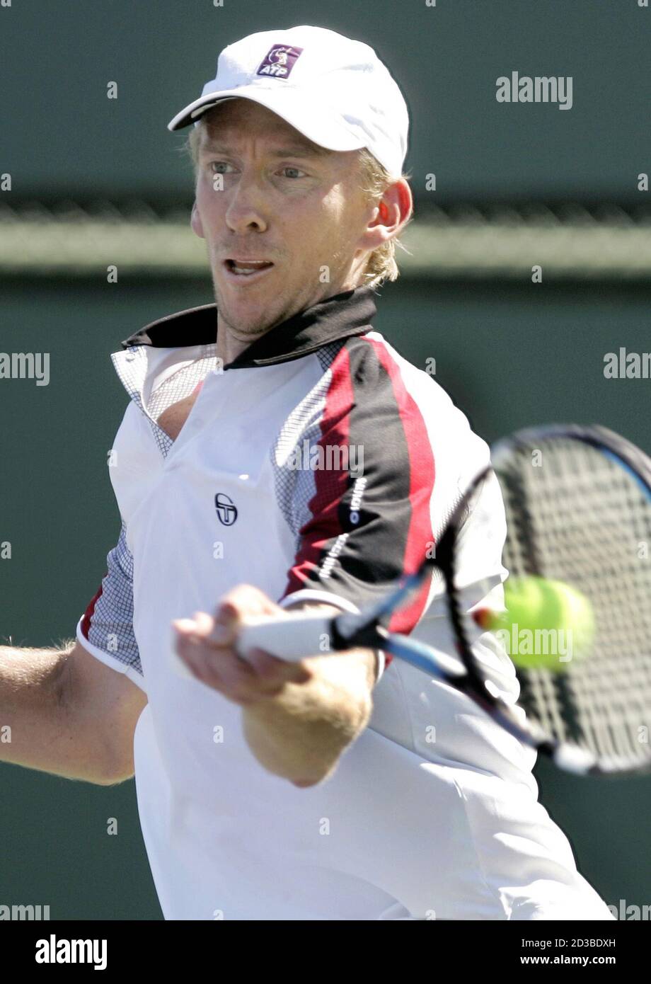 Wayne Arthurs of Australia returns a backhand during his qualifying match against Juan Pablo Brzezicki of Argentina at the Pacific Life Open in Indian Wells, California, March 9, 2005. REUTERS/Robert Galbraith  RG Stock Photo