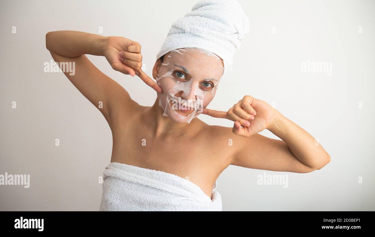 Woman face mask smile spa hi-res stock photography and images - Alamy