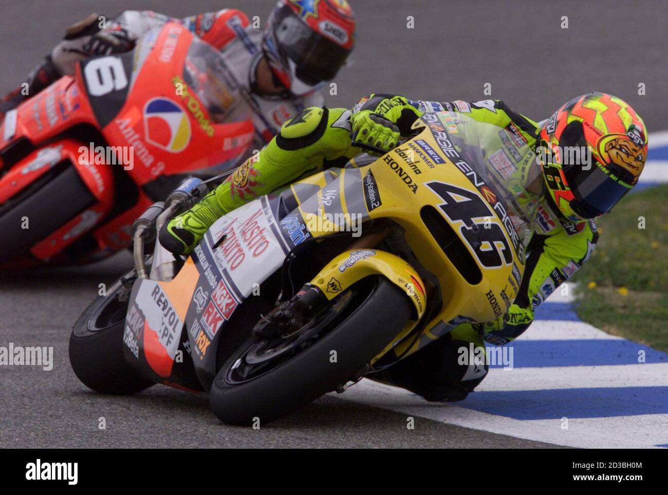 Italy's Valentino Rossi leads Japan's Norick Abe around a curve on his way  to victory in the 500cc race at the Spanish Motorcycle Grand Prix at Jerez  May 6, 2001. Abe was