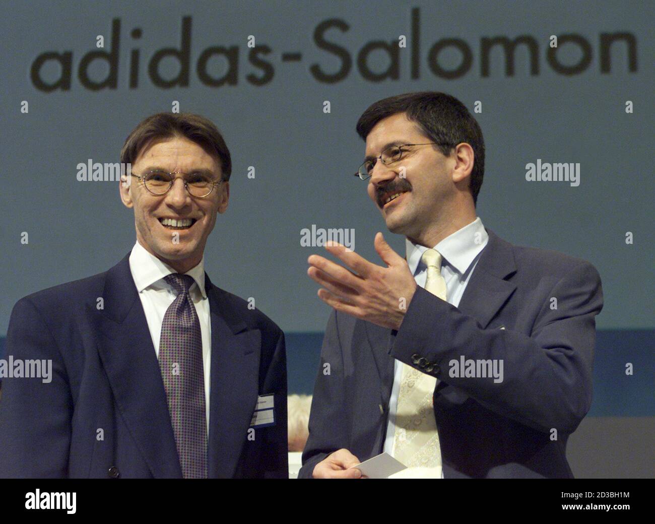 Herbert Hainer (R), CEO of German-French sportwear producer adidas-Salomon  is seen with new financial manager Robin Stalker ahead of the annual share  holders meeting in Fuerth near Nueremberg May 10, 2001. A