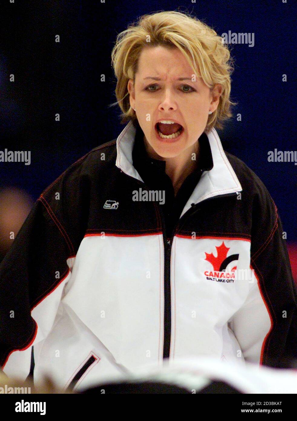 Skip Kelley Law of Canada shouts to her sweepers during a semifinal match  against Great Britain during the Salt Lake 2002 Winter Olympic Games  women's curling in Ogden, February 20, 2002. REUTERS/Andy