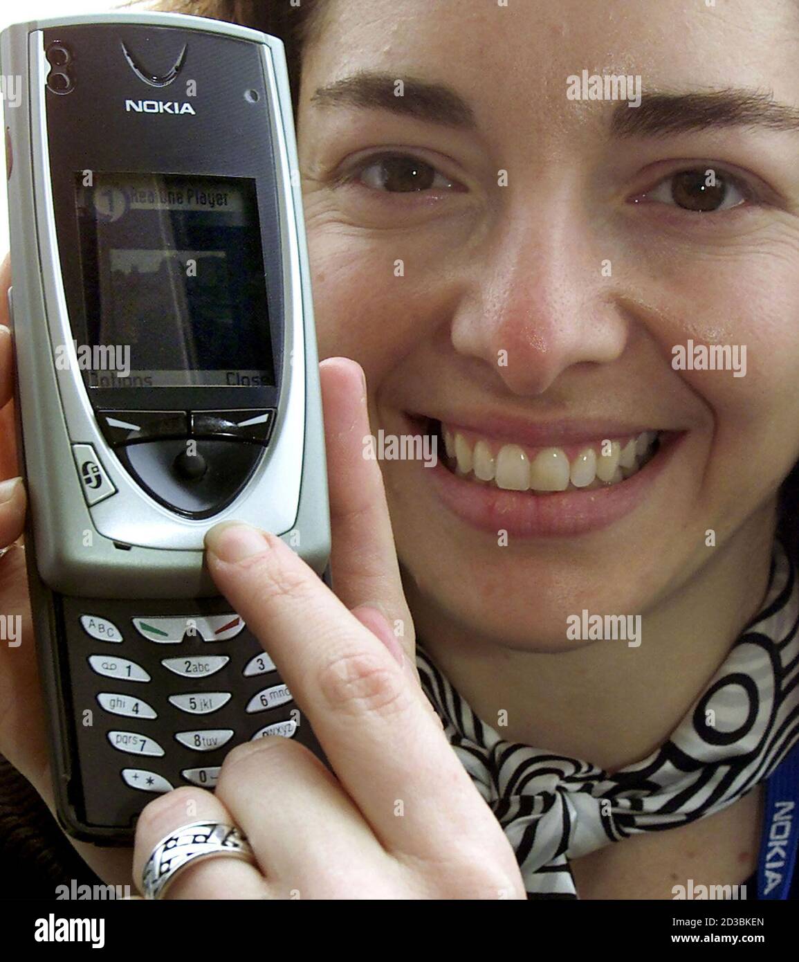 A Model Displays The Latest Nokia 7650 Mobile Phone With An Integrated Camera As World Premier At The Cebit In Hanover March 12 02 About 8 000 Exhibitors Will Present Their Products At