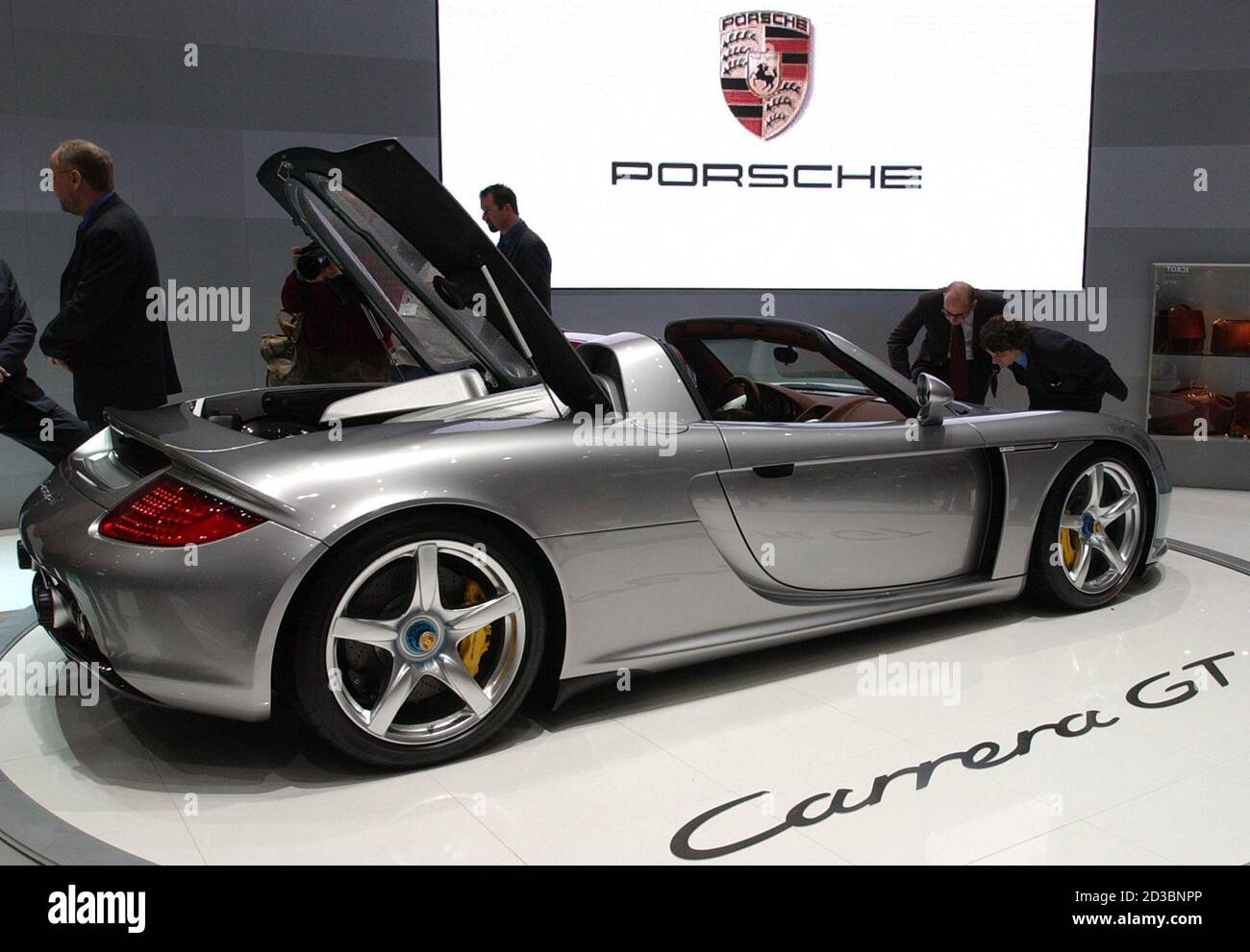 The new Porsche Carrera GT is seen on display as a first world presentation  at the Geneva car show in Geneva, Switzerland, March 4, 2003. The car comes  equipped with a 