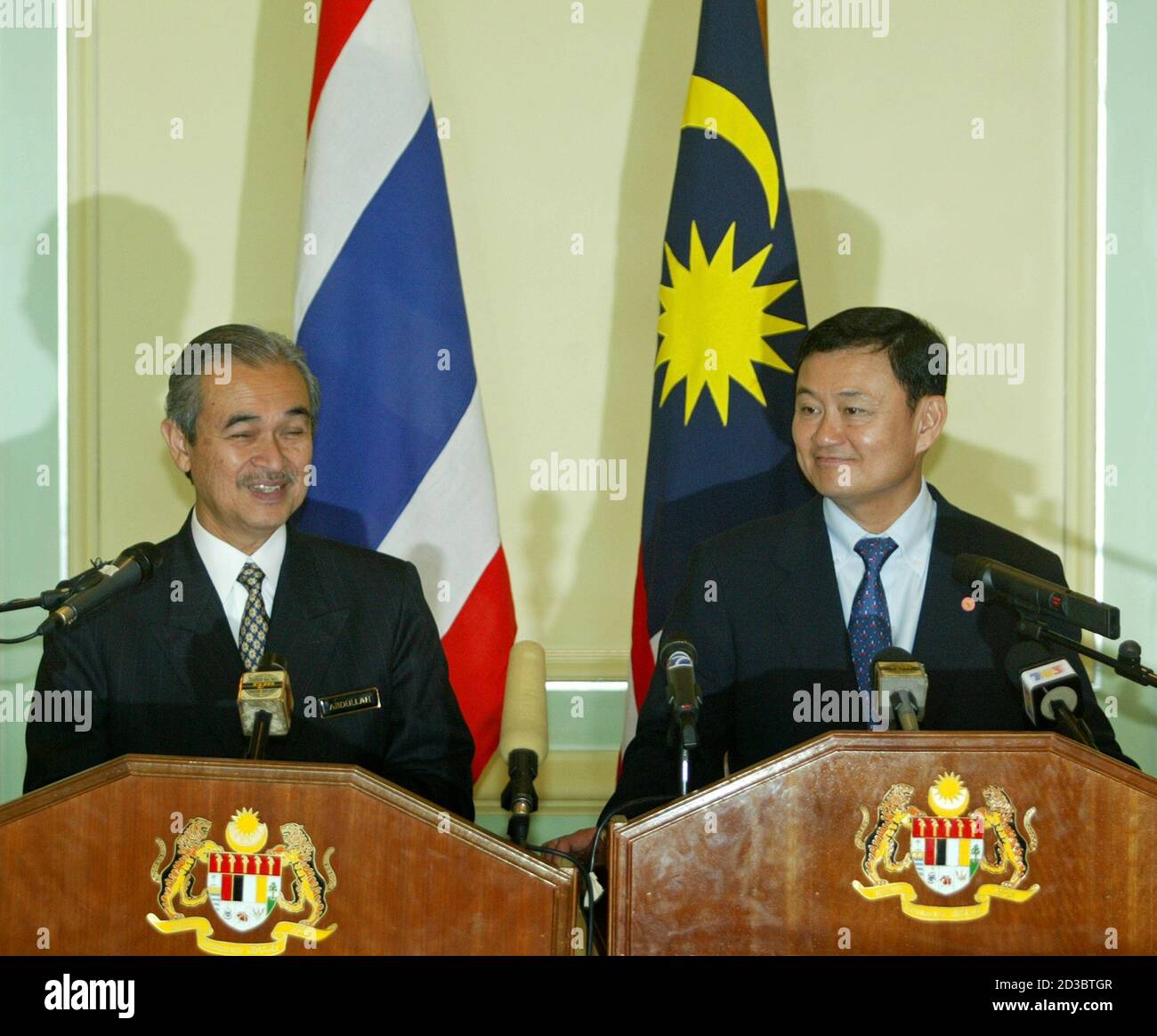 Thai Prime Minister And Thaksin Shinawatra Smile During A News Conference In Putrajaya Near Kuala Lumpur Visiting Thai Prime Minister Thaksin Shinawatra R And His Malaysian Counterpart Abdullah Ahmad Badawi Smile During