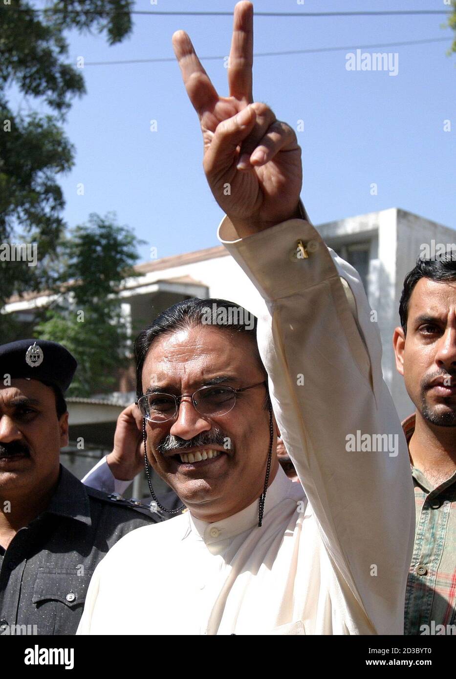 Asif Ali Zardari Husband Of Opposition Leader In Exile Benazir Bhutto Shows The Victory Sign Outside His Residence In Lahore Asif Ali Zardari Husband Of Opposition Leader In Exile Benazir Bhutto Shows The Victory Sign Outside His Residence Asif Ali Zardari Husband Of Opposition Leader In Exile Benazir Bhutto Shows The Victory Sign Outside His Residence In Lahore Asif Ali Zardari Husband Of Opposition Leader In Exile Benazir Bhutto Shows The Victory Sign Outside His Residence