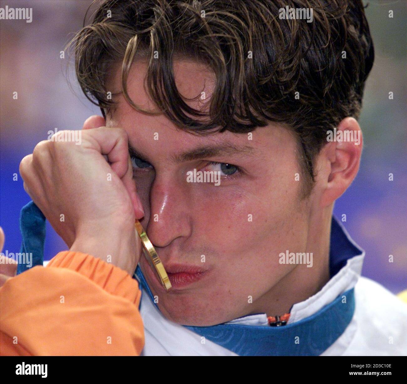Dutch Pieter Van Den Hoogenband Kisses His Gold Medal After The Men S 200m Freestyle Awarding Ceremony At The Sydney Olympic Games On September 18 2000 Van Den Hoogenband Clocked 1 45 35 Seconds To