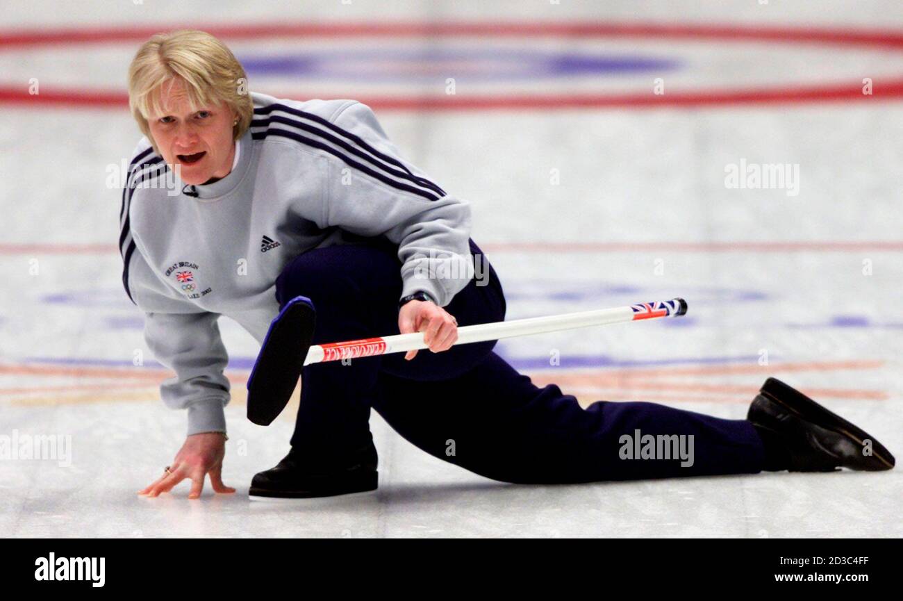 Great Britain skip Rhona Martin shouts to the sweepers as she watches the  stone's action in the house during the women's curling gold medal match  against Switzerland at the Salt Lake 2002