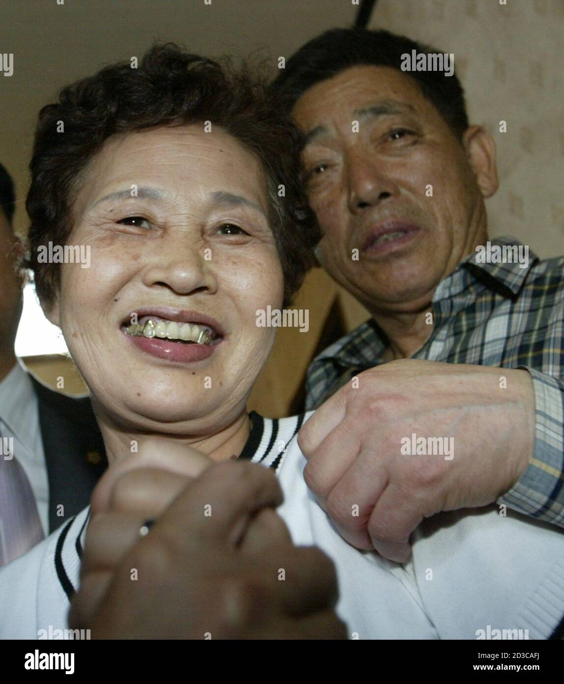 Shin Young Ja L And Kim Jong Kyu Parents Of South Korean Kim Sun Il Who Was Kidnapped By Iraqi Militants In Falluja Smile As They Heard The News That Kim Is Alive In Pusan