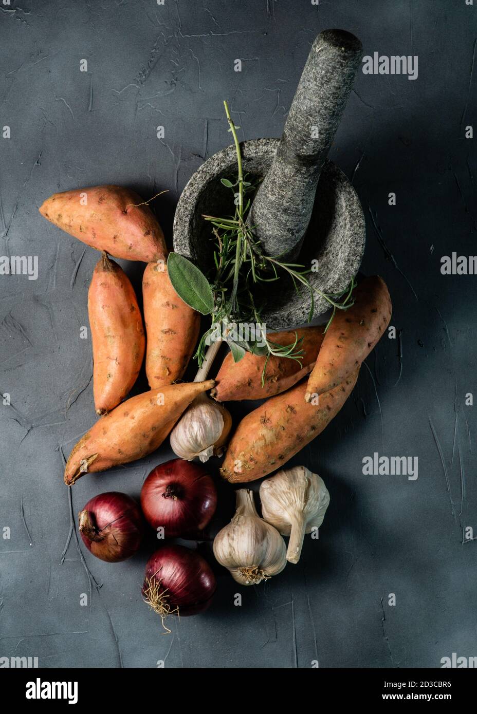sweet potato, red onion and garlic Stock Photo Alamy