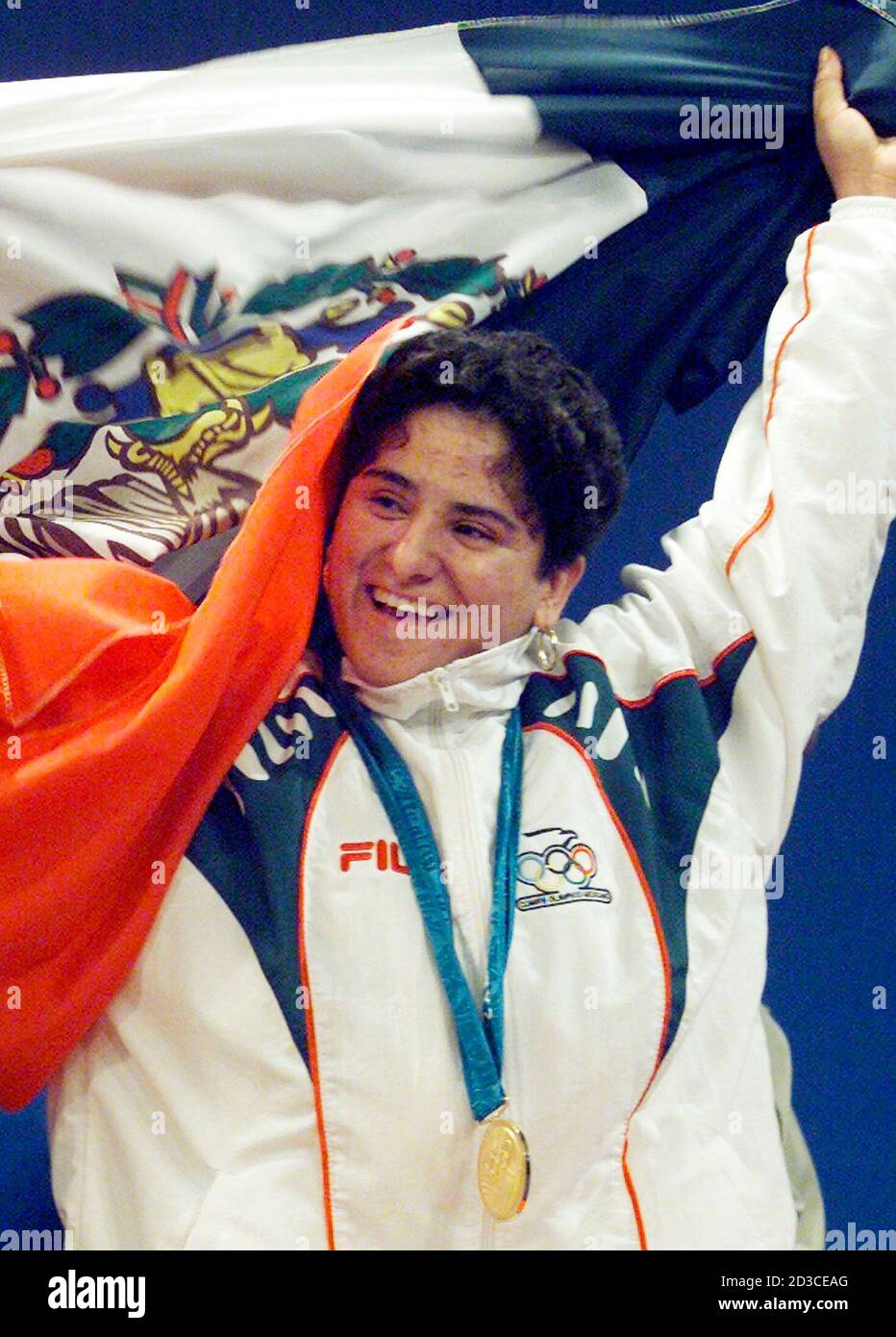 Mexican Weightlifter Soraya Jimenez Holds Up Her Country S Flag At The Podium After Winning The Gold Medal In The 58 Kg Weight Class At The Sydney 2000 Olympic Games September 18 2000