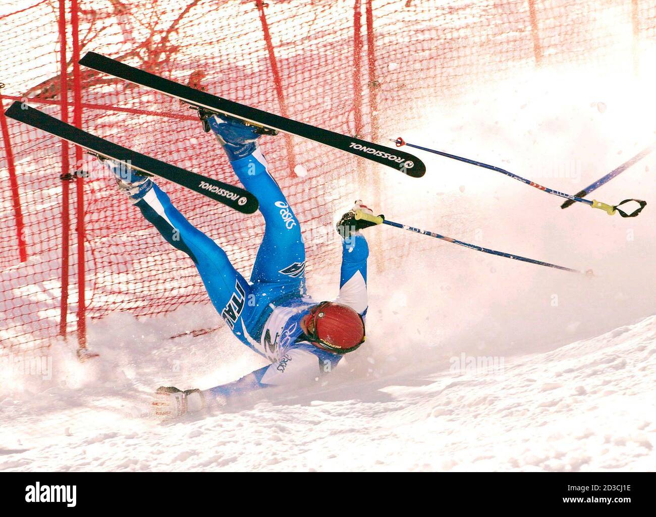 Alexander Ploner of Italy crashes head over heels through a gate during the  second run of the men's giant slalom alpine skiing event at the Salt Lake  2002 Olympic Winter Games February