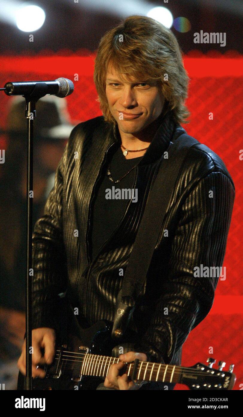 U.S. singer Jon Bon Jovi performs a song during German television show "Bet  It....?!" (Wetten Dass...?!") in Duesseldorf November 9, 2002. "Wetten  Dass...?!" is Europe\