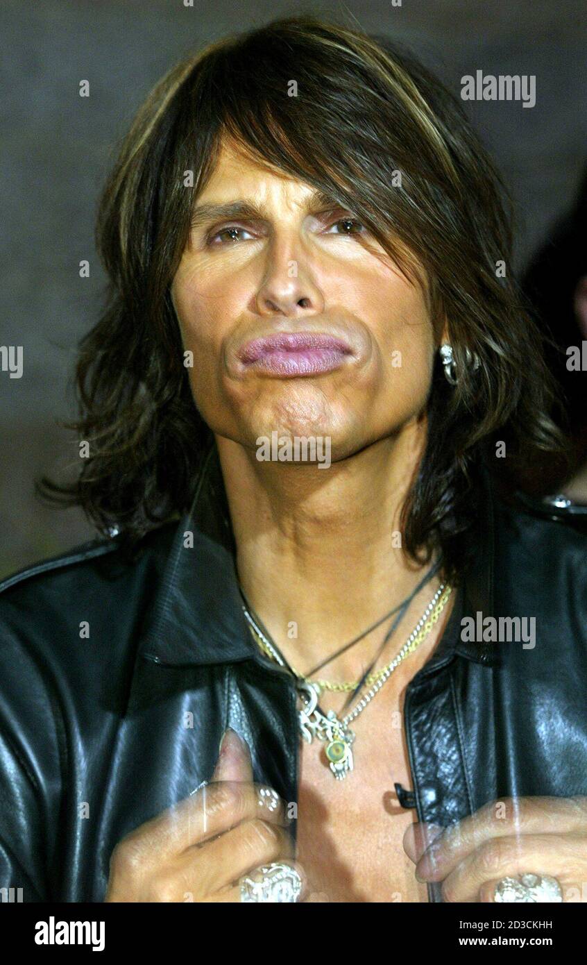 Steven Tyler of the rock group Aerosmith mugs for a photographer as he arrives at the 2002 Billboard Music Awards show at the MGM Grand Garden Arena in Las Vegas, Nevada, December 9, 2002. Stock Photo