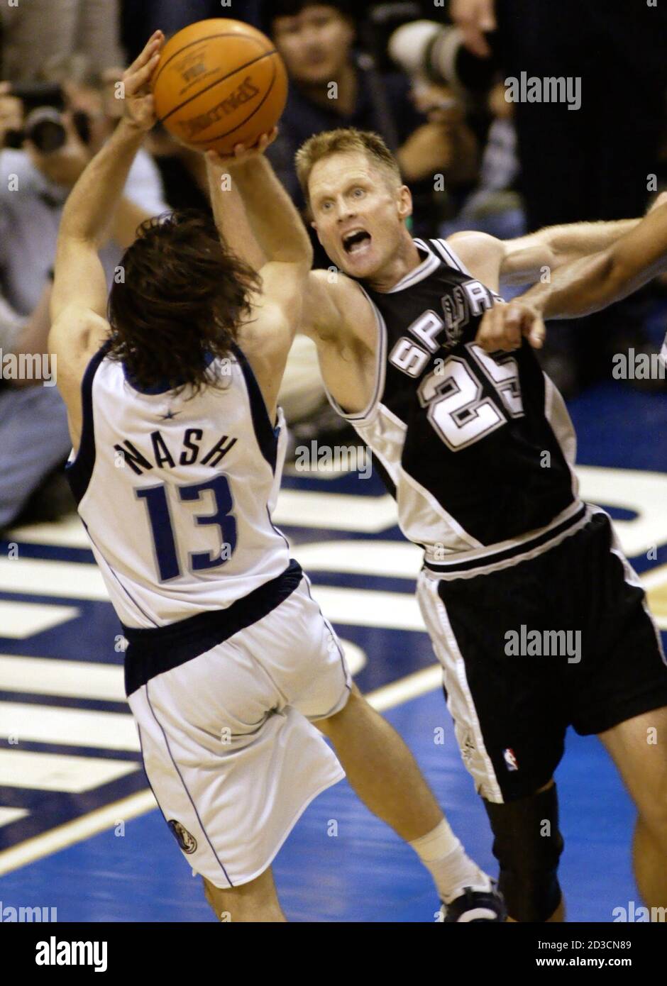 San Antonio Spurs guard Steve Kerr (R) fouls Chicago Bulls guard John  Starks as he brings the ball up court during the first quarter in Chicago,  February 25. SUE/SV Stock Photo -