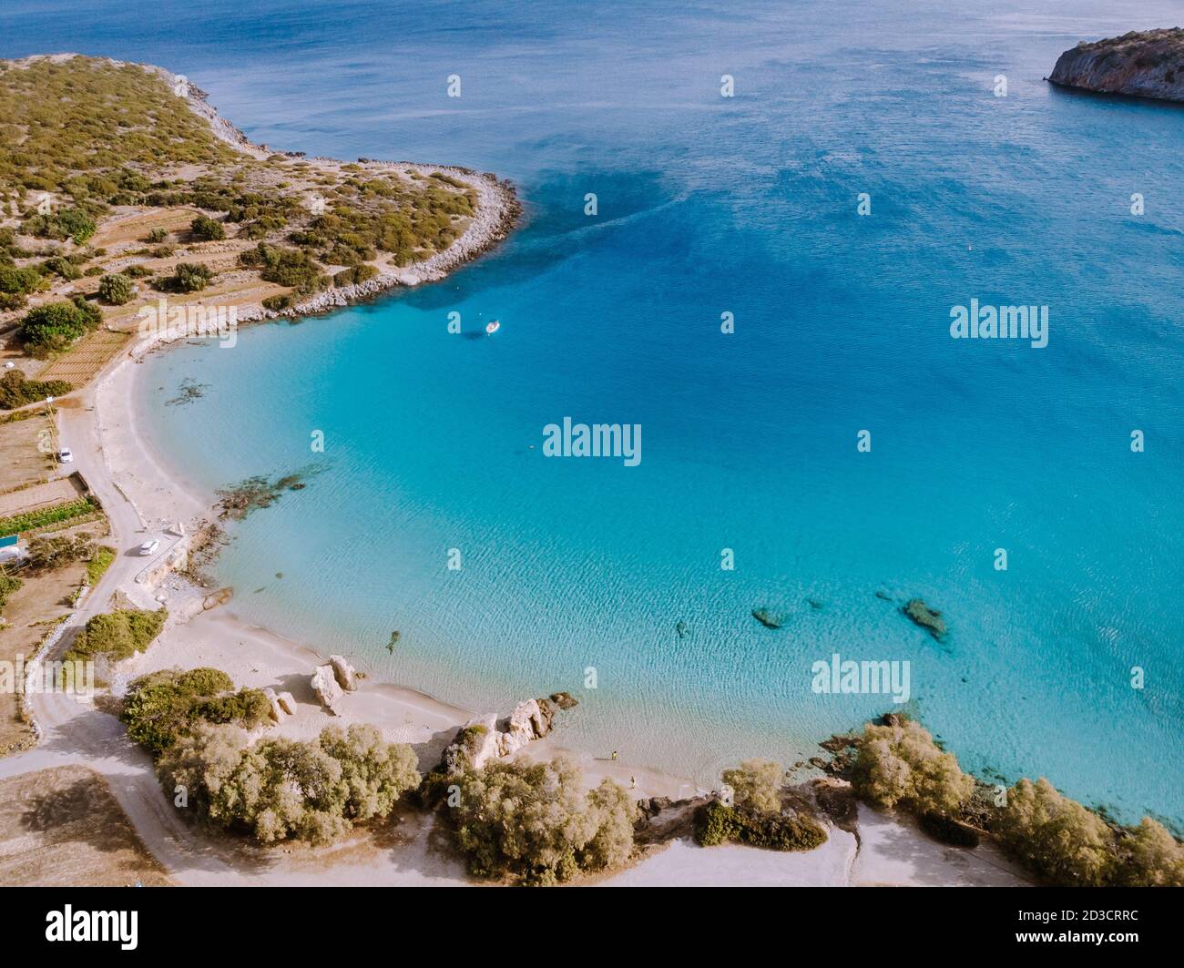 Tropical beach of Voulisma beach, Istron, Crete, Greece, couple on vacation in Greece Stock Photo