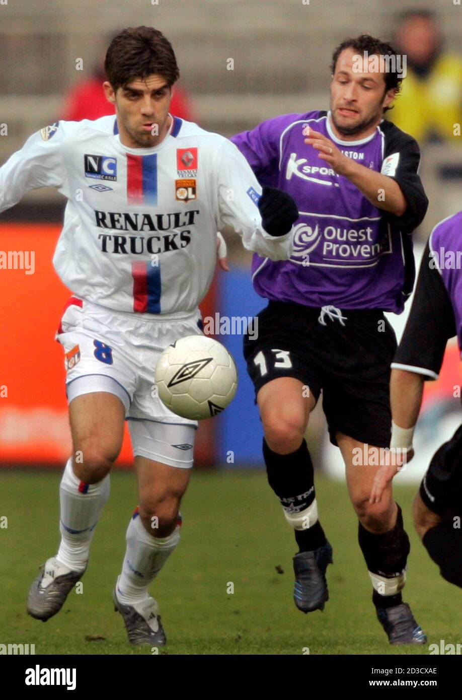Olympique Lyon S Brazilian Player Juninho L Challenges Philippe Delaye R Of Istres During Their French Ligue Olympique Lyon S Brazilian Player Juninho L Challenges Philippe Delaye R Of Istres During Their French Ligue