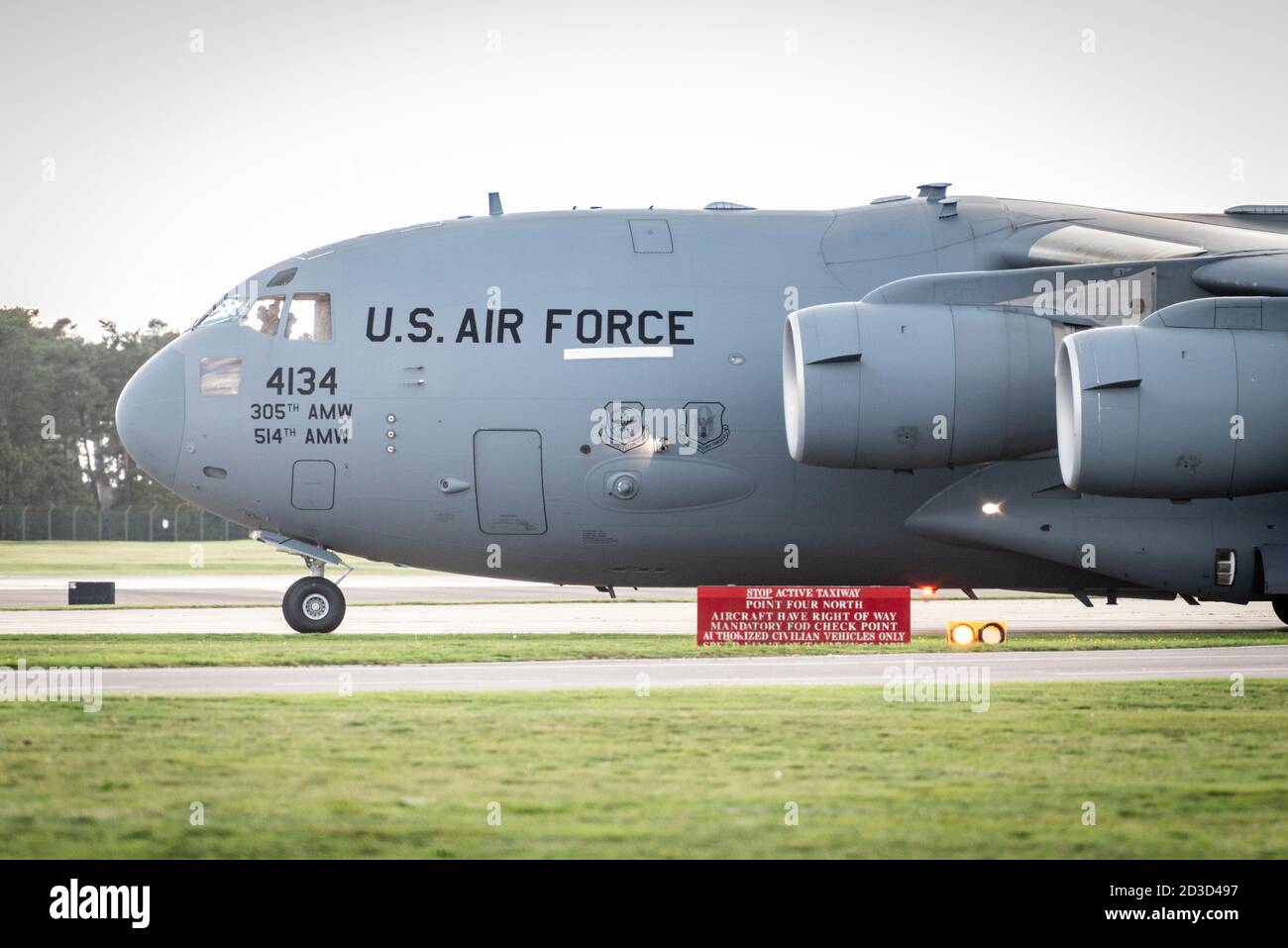 A USAF US Air Force C17 globetrotter transport plane taxiing on the runway at RAF Lakenhealth UK Stock Photo