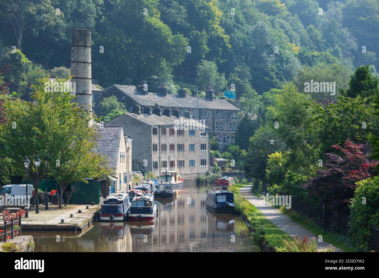 Mill chimney and barges on the Rochdale Canal at Hebden Bridge, Calderdale, West Yorkshire UK, (summer august 2020) Stock Photo