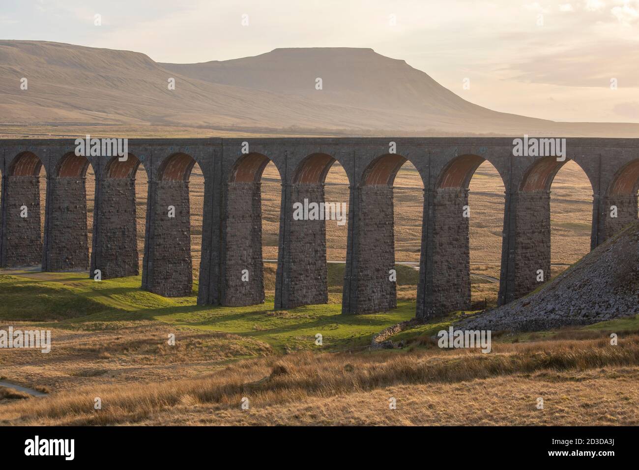 Ribblehead Viaduct from Batty Moss, with view of Ingleborough Hill in the distance. Ribblesdale, North Yorkshire, Yorkshire Dales National Park. Winte Stock Photo