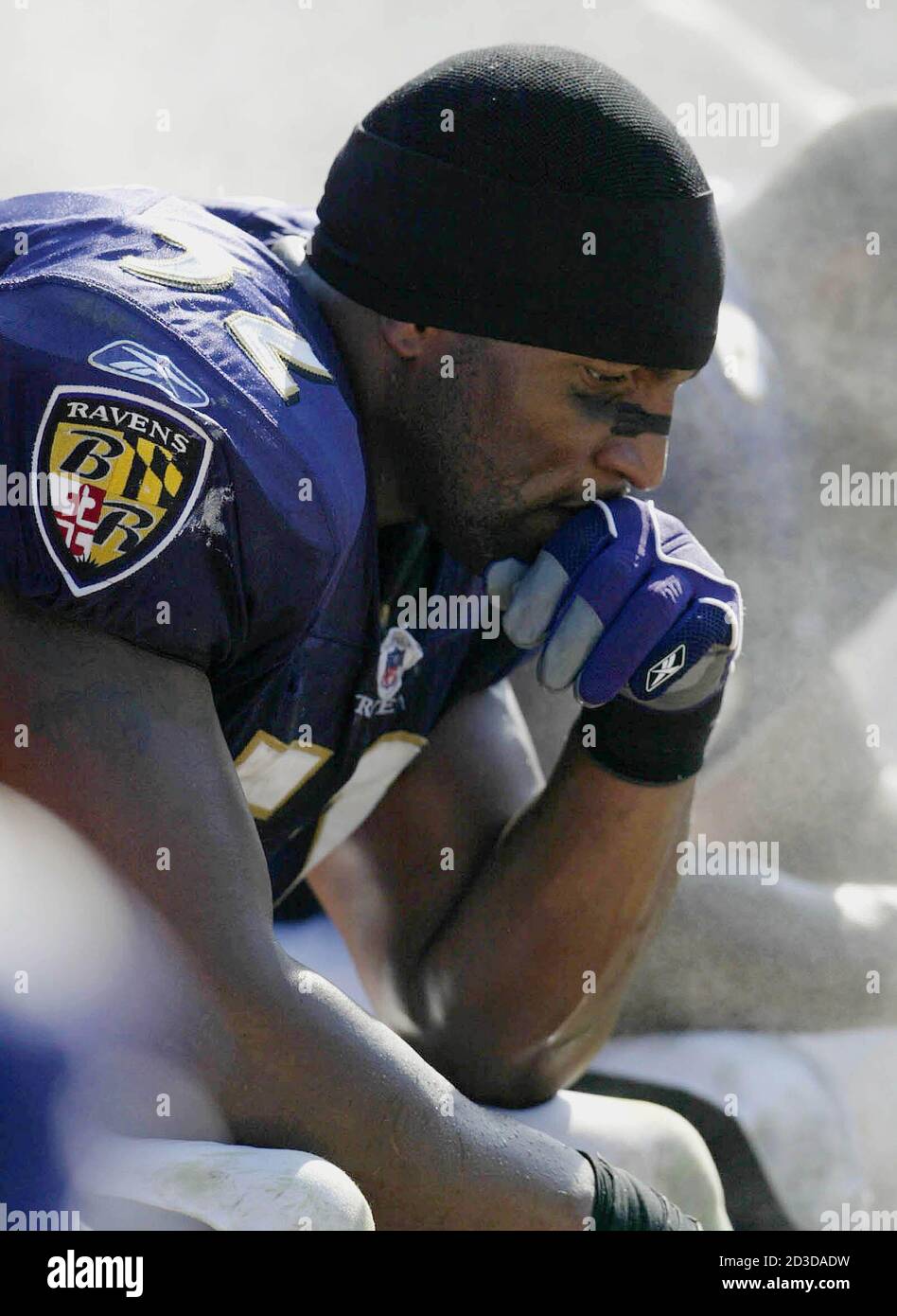 Baltimore Ravens linebacker Ray Lewis sits on the bench late in the fourth  quarter as the