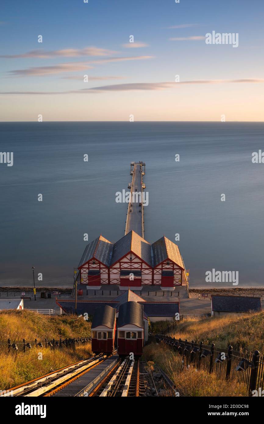 The Funicular railway and views over Saltburn Pier and the north Sea from Saltburn, Redcar and Cleveland, North Yorkshire at sun rise. North York Moor Stock Photo