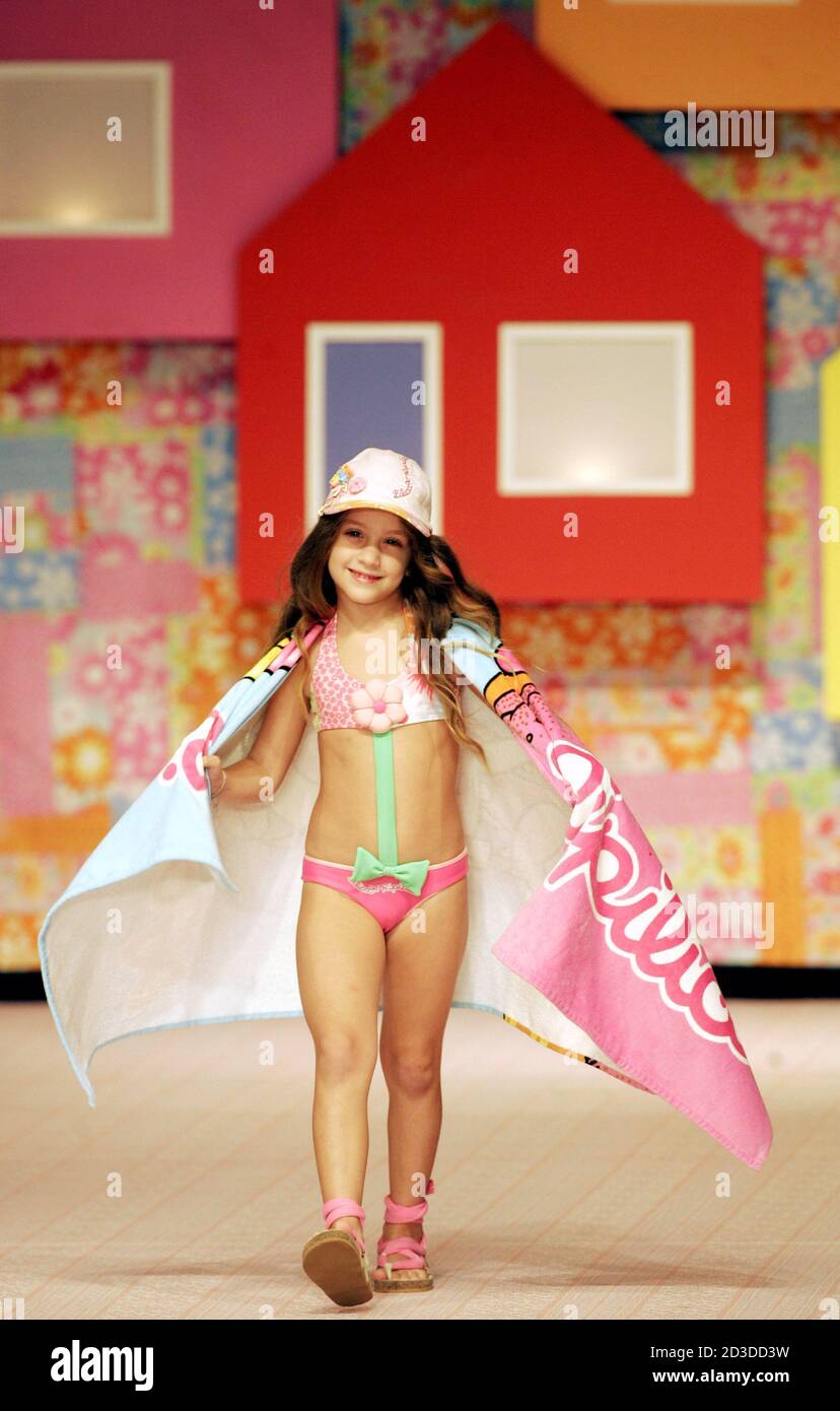 A child model present a creation from the Lilica Ripilica spring summer  collection at the Fashion Rio Show in Rio de Janeiro. A child model  presents a creation as part of Lilica