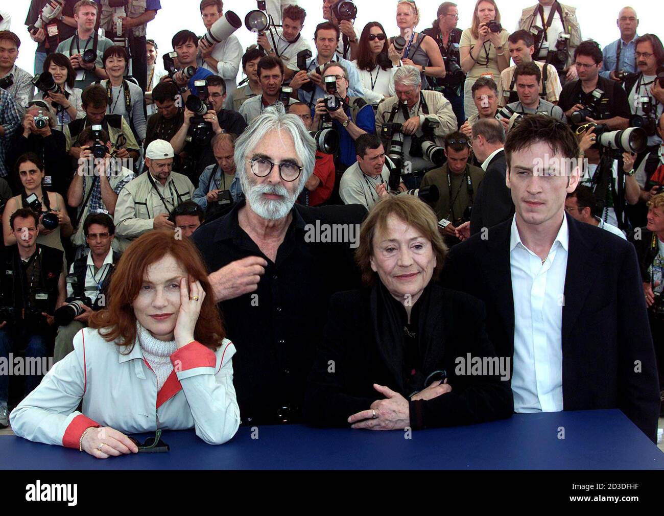 German Born Austrian Director Michael Haneke 2nd L Stands With Cast From L R French Actresses Isabelle Huppert And Annie Girardot And Actor Benoit Magimel During A Photo Call For Their Film La Pianiste