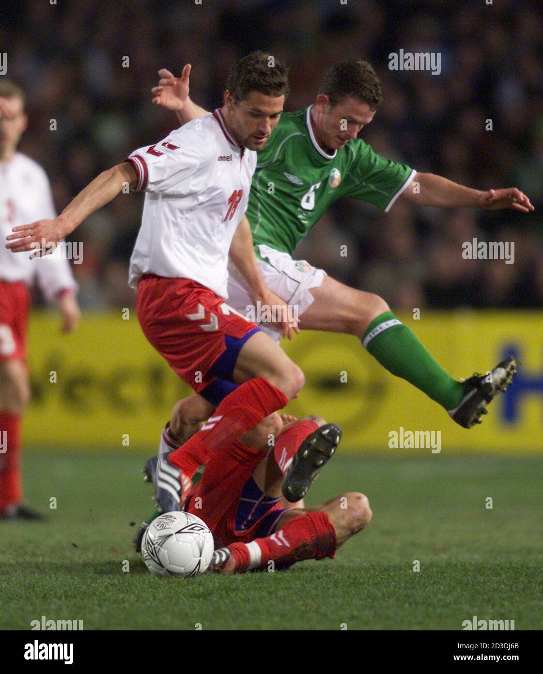 DENMARKS MADSEN AND SAND CLASH WITH IRELAND'S KINSELLA DURING FRIENDLY  MATCH AT LANSDOWNE ROAD DUBLIN. Denmarks's Peter Madsen (L) and Republic of  Ireland's Mark Kinsella (R) stumble over Denmarks Ebbe Sand during