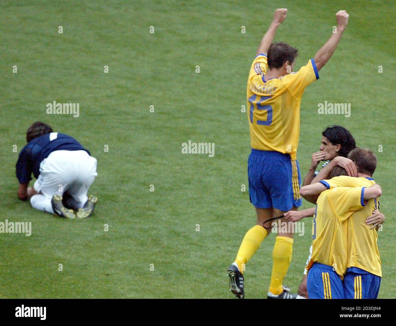 Argentina S Claudio Lopez Lays On The Pitch As Sweden S Andreas Jakobsson 15 Mattias Jonson Frontl And Andreas Jakobsson Frontr Celebrate After A 1 1 Draw In A Group F Match At The World