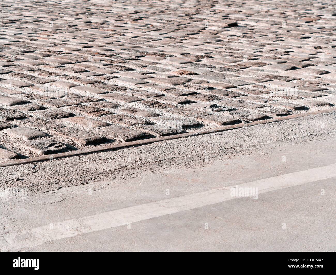 Urban stone paving stones. Texture, background, selective focus Stock Photo