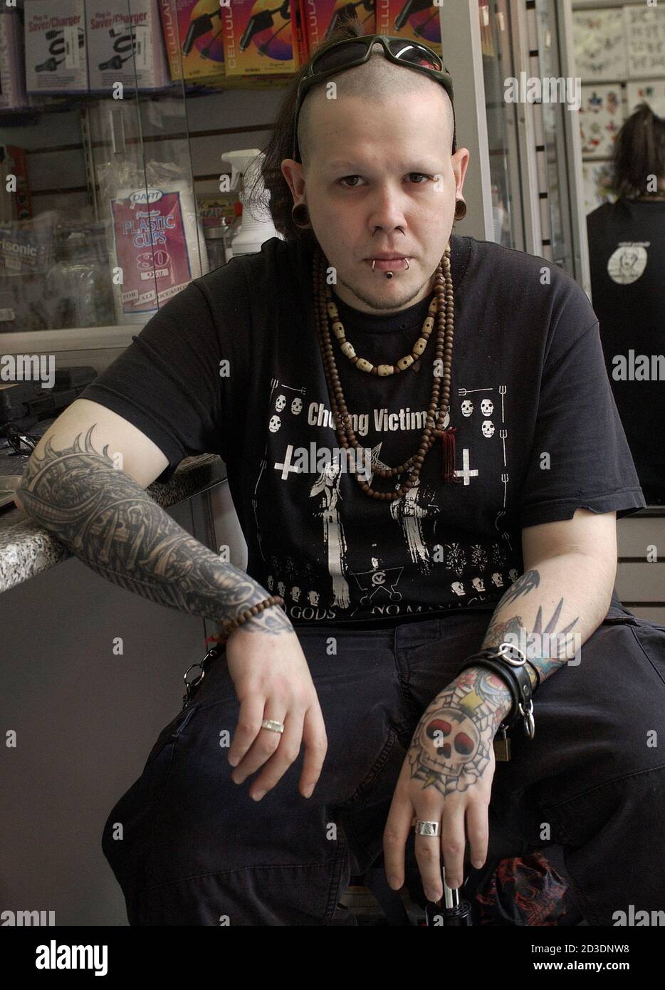 Ian, a 25-year-old tattoo artist, who had his tongue split as a form of body art in New York, May 27, 2003, after it has healed on June 17. Extreme body modification, Ian, a 25-year-old tattoo artist, who had his tongue split as a form of body art in New York, May 27, 2003, after it has healed on June 17. Extreme body modification,
