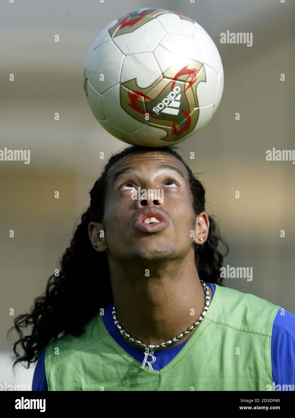 Brazilian striker Ronaldinho, of French team Paris Saint Germain,shows off his ball skill during a squad practice session at Cam de Loges in Saint Germain En-Lay, 40km from Paris, June 14, 2003. Brazil will face Cameroon on June 19 in the Confederations Cup. REUTERS/Paulo Whitaker  PW/AA Stock Photo
