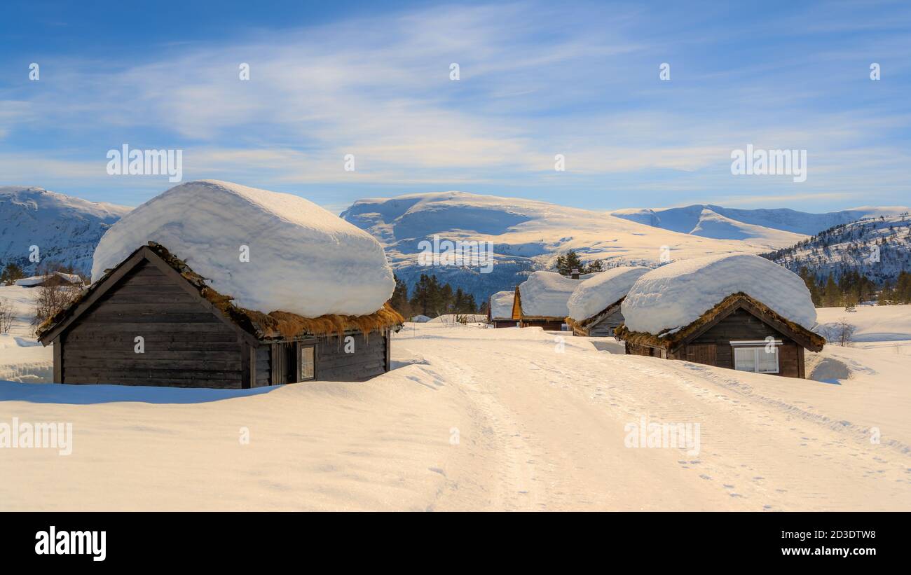 STRYN, NORWAY - 2018 MARCH 29. Cottages with lots of snow on the rooftop  Stock Photo - Alamy