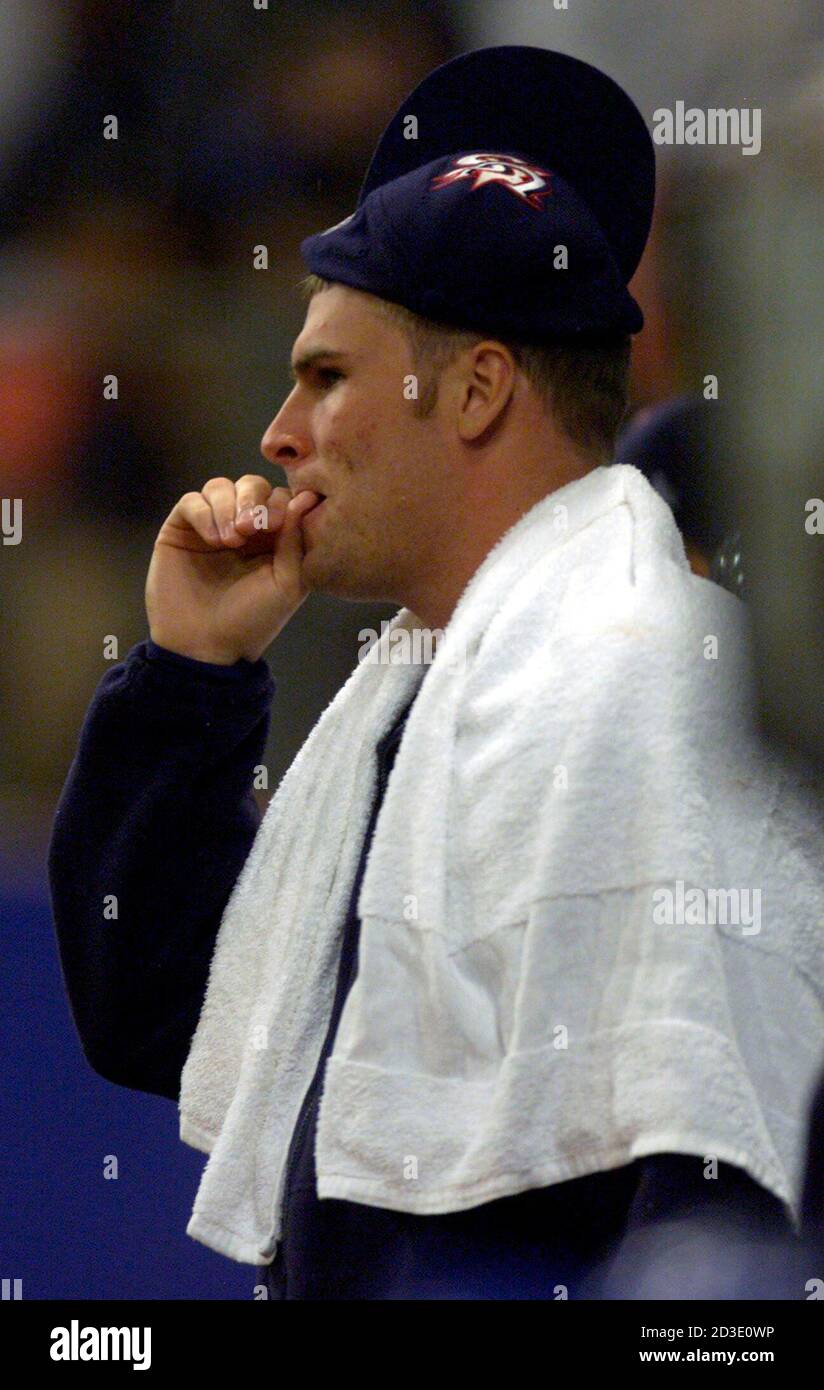 USA's pitcher Todd Williams bites his nails in the 6th inning against South  Korea during their men's baseball semifinal match at the Olympic Games in  Sydney September 26, 2000. The winner of
