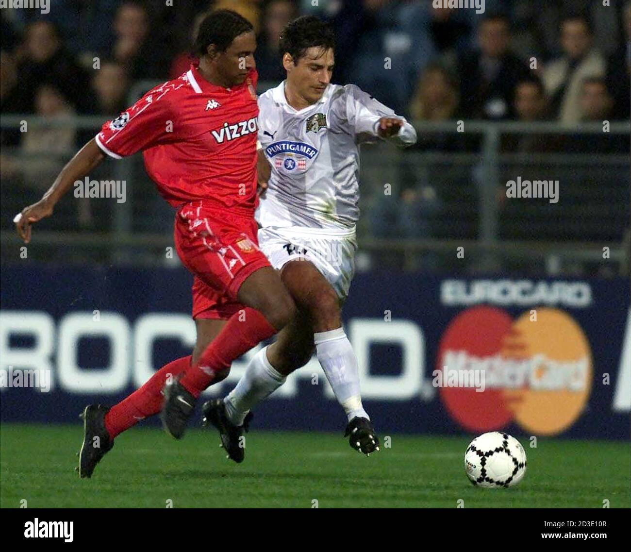 Ivica Vastic (R) of Sturm Graz fights for the ball with Ousmane Dabo (L) of  AS. Monaco during their Champions League Group D soccer match in Graz  October 17, 2000. LF/CLH Stock