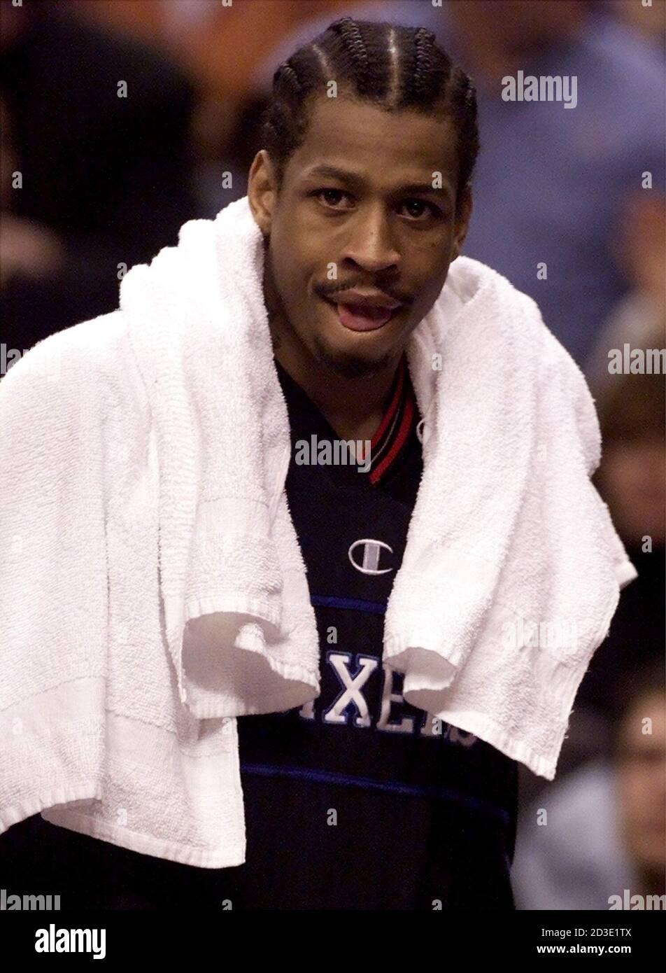 Philadelphia 76ers guard Allen Iverson licks his lips during a time out in  the fourth quarter of his NBA game against the Toronto Raptors at the Air  Canada Centre in Toronto, April