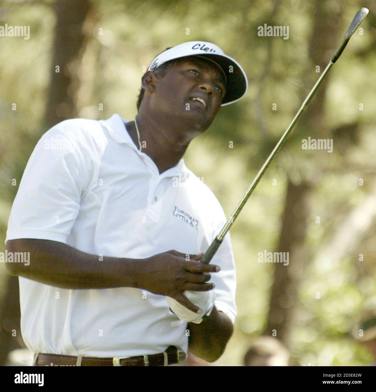 Vijay Singh watches his tee shot from the second hole, during the third round of The International in Castle Rock, Colorado, August 9, 2003. Singh is among the leaders during the third round of the tournament, which uses the modified Stableford scoring system. REUTERS/Gary C. Caskey  GCC/GN Stock Photo