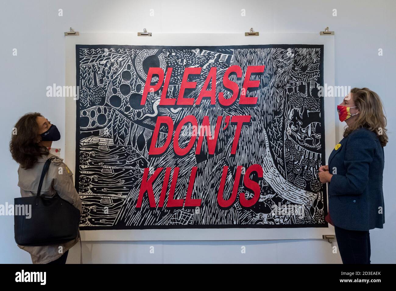 London, UK.  8 October 2020. Visitors view 'Please Don't Kill Us', 2013, both by Cameron Platter.  Preview of 1-54 Contemporary African Art Fair, the leading international art fair dedicated to contemporary art from Africa and its diaspora, taking place at Somerset House.  The fair showcases the work of more than 110 emerging and established artists from Africa and is the only physical art fair taking place during Frieze Week. Credit: Stephen Chung / Alamy Live News Stock Photo