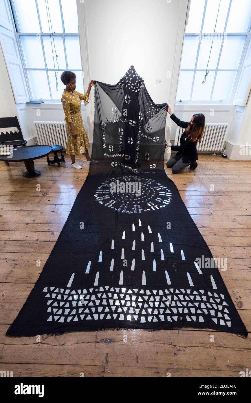 London, UK.  8 October 2020. Staff members present 'Astral Sea III', 2019, by Tsedeye Makonnen.  Preview of 1-54 Contemporary African Art Fair, the leading international art fair dedicated to contemporary art from Africa and its diaspora, taking place at Somerset House.  The fair showcases the work of more than 110 emerging and established artists from Africa and is the only physical art fair taking place during Frieze Week.  Credit: Stephen Chung / Alamy Live News Stock Photo