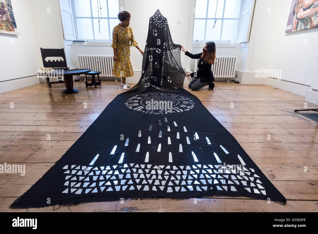 London, UK.  8 October 2020. Staff members present 'Astral Sea III', 2019, by Tsedeye Makonnen.  Preview of 1-54 Contemporary African Art Fair, the leading international art fair dedicated to contemporary art from Africa and its diaspora, taking place at Somerset House.  The fair showcases the work of more than 110 emerging and established artists from Africa and is the only physical art fair taking place during Frieze Week.  Credit: Stephen Chung / Alamy Live News Stock Photo