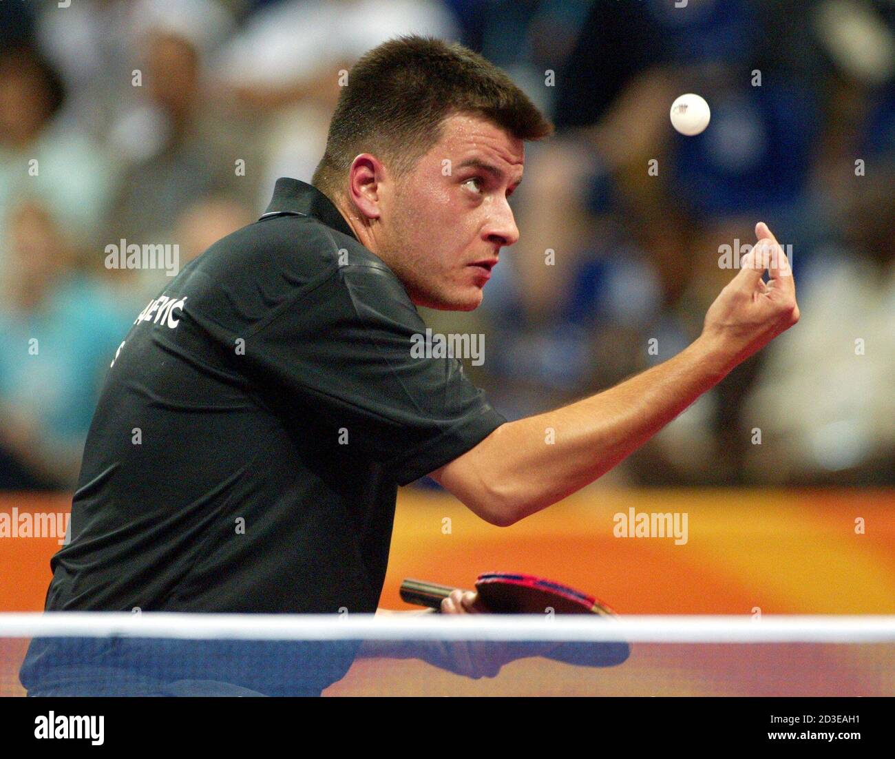Serbia and Montenegros Karakasevic serves during his match against Swedens  Waldner at the Athens 2004 Olympic Games. Serbia and Montenegro's  Aleksandar Karakasevic serves during his men's singles third round table  tennis match