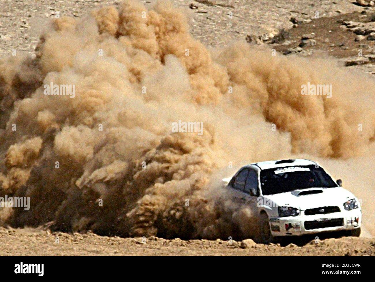 United Arab Emirates driver Al-Qassimi and his co-driver Orr drive their  Subaru WRX STI at the second leg of the Jordan International rally. United  Arab Emirates driver Khalid Al-Qassimi and his co-driver